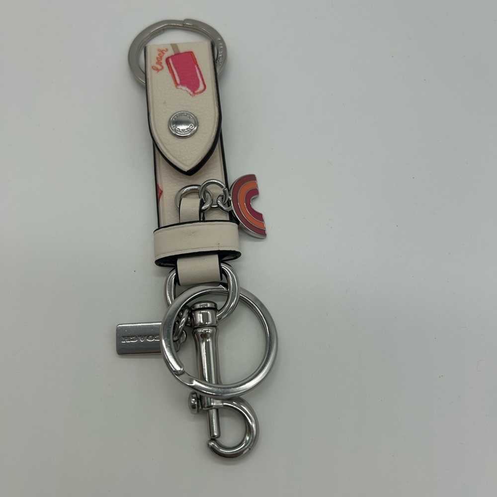 Coach Cream and Pink Coach trigger snap keychain bag charm